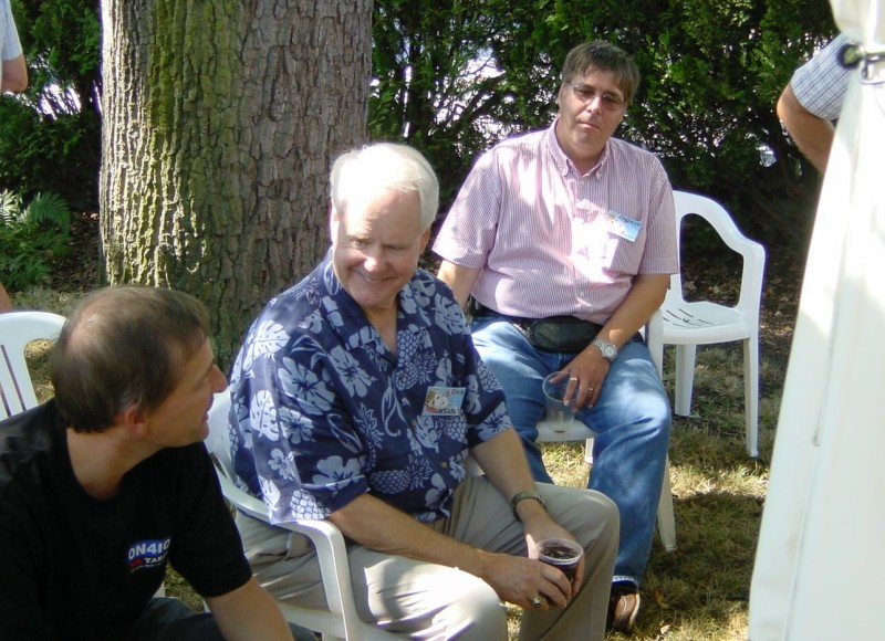 ../Images/Dick-K5AND talking with Jon-N0JK with Peter OH2AVP in the background.jpg